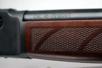 Henry's Updates .30-30 and .45-70: Review Redux The checkering on the forends provides a grip surface.