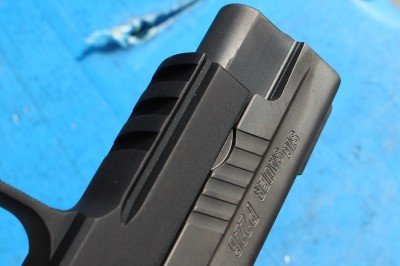 The Best SIG P226? The TacOps--Review The rail on the front is functional, and not as boxy as most rails.