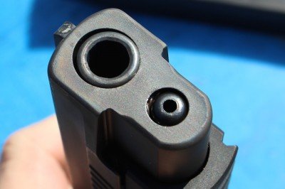 The Best SIG P226? The TacOps--Review Even with the tilting barrel, the frame fits tightly.