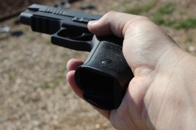 The Best SIG P226? The TacOps--Review Mag reloads are easy thanks to the flared grip.