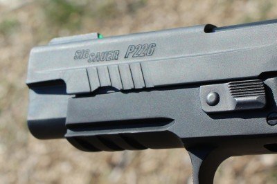 The Best SIG P226? The TacOps--Review Forward serrations make manipulation even more versatile.
