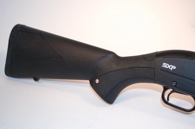 10 Things to Look For In A SHTF Shotgun The stock is hard plastic with grip surfaces molded in where needed.