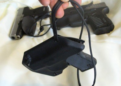 The neck holster comes with a lanyard and hangs like this for the Kel-Tec P3AT.