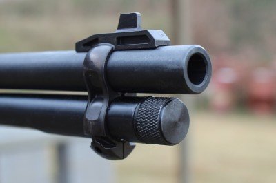 Henry's Updates .30-30 and .45-70: Review Redux The front sight on the earlier version was built into a barrel band.