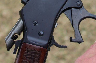 Henry's Updates .30-30 and .45-70: Review Redux Here you can see how the lever itself line up with the bolt, which holds it in place.