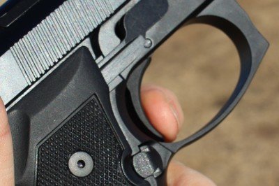 If the safety is engaged, the trigger rocks back with no resistance. 