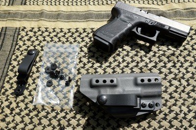 NSR C-5 Concealment Tuckable Folder Over Holster The loops and hardward can be positioned to allow for various positions and heights.