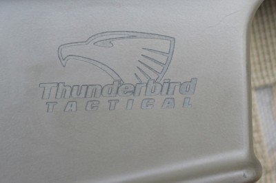 The Thunderbird Tactical logo is emblazoned on the side of the rifle.