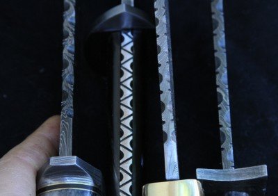 Cheap Damascus Knives for Christmas! Look for a variety of filework on the knives. It is nice, but not everyone's taste.