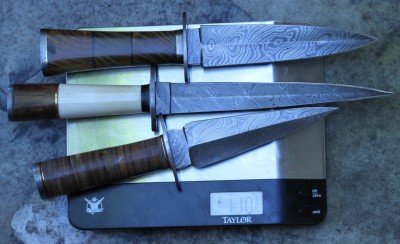 Cheap Damascus Knives for Christmas! These three knives were surprisingly light, though they still feel like good quality knives.