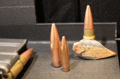 Next to a .30 Caliber bullet. 