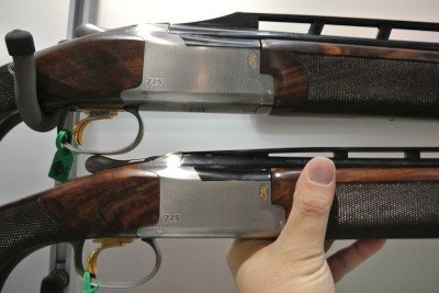 The 28 gauge (bottom) next to a full sized.  The receivers are a bit smaller. 