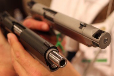 One with a muzzle brake. The other looks like it wanted to be threaded.