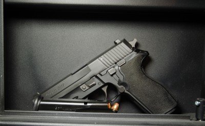 If you're in need, this SIG Sauer P227 in a wall safe is a friend indeed.