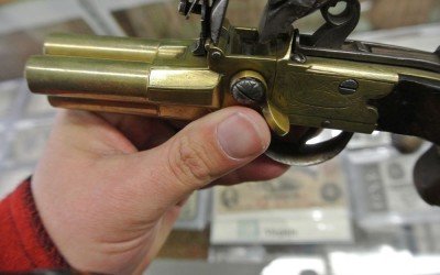 Selling History-Cohen and Sons of New Orleans The lever by my thumb turns to let expose the touch hole for the different barrels. They don't all three go off at once... in theory at least.