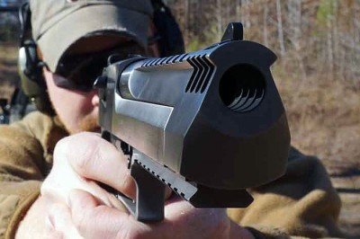 The compensator takes some of the bite off of the muzzle flip. 