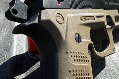 Recover that Beretta m9 The grips screw into place where the old panels were, so there's not to much change in the width.