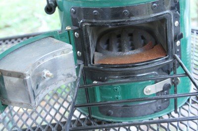 This is the oven before I used it. Note the rust because I had left it outside for about a month before testing it, and also note the extra grate they give you for charcoal, which is my next adventure with the StoveTec.