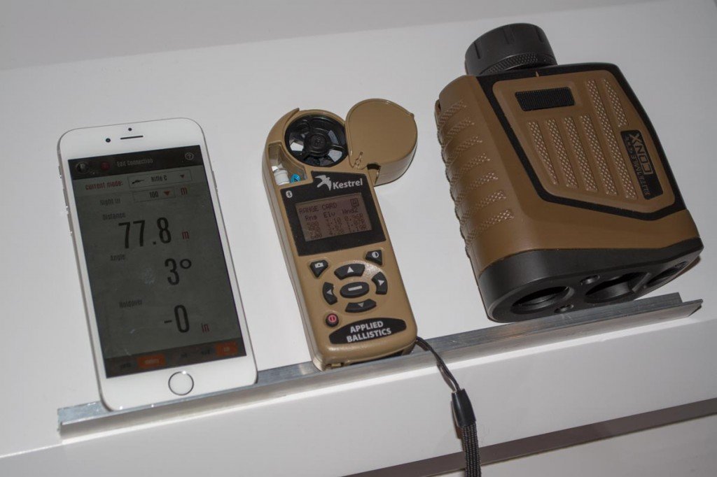 Bushnell's ARC CONX (right) shown with Kestrel meter and smartphone app.