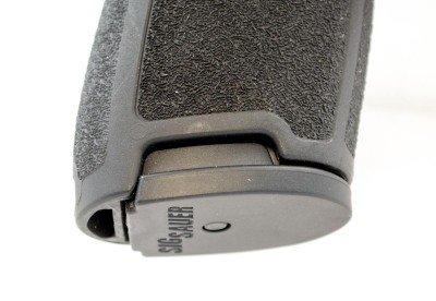 New Striker Pistol From Sig Sauer - P320 - Full Gun Review The grip has cutouts for manual magazine access if needed.