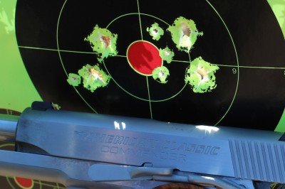 From 25 yards. Yes the smaller holes are from a different gun. We care about the environment and recycle here at GunsAmerica.