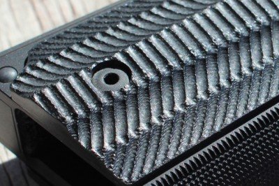 The Single Stack 9mm Perfected--Nighthawk T4 If you like an agressive grip, you'll dig these. The checkering and lines are all precise and well executed, but the grooves in these grips are like a rasp.