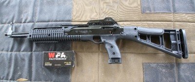 The Hi-Point 4595 TS is probably the cheapest pistol caliber carbine on the market. Your local gunshop probably has 4 of them on the shelf, in all the calibers. They work great, shoot great, and are accurate enough.