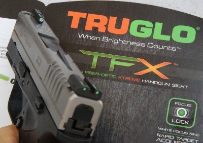 The Truglo TFX is their new tritium night sight. They are glass capsules filled with a glowing radioactive isotope of hydrogen, and they don't need to be charged up by a light source first. They last about 12 years before starting to dim. 