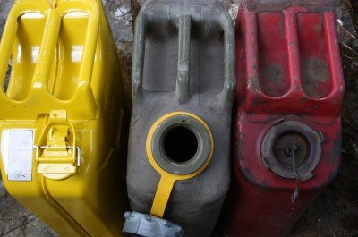 The other thing you need, unless you intend to make your own fuel line system, is an "old style" Jerry can. On the right, the red one is what you are looking for. They are usually $50 and ugly, but the insides are enameled and they last forever. The middle one is the plastic can I have linked to in the article, and on the left is the yellow version of the modern Jerry can you'll find all over the place online for about $35 each. YOU CAN'T USE THE MODERN CANS like the yellow one.