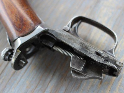 The trigger group is attached to the stock. 