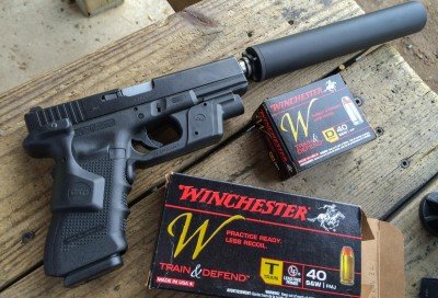 We tested the .40 S&W Winchester Train and Defend in several different guns including this suppressed Glock.