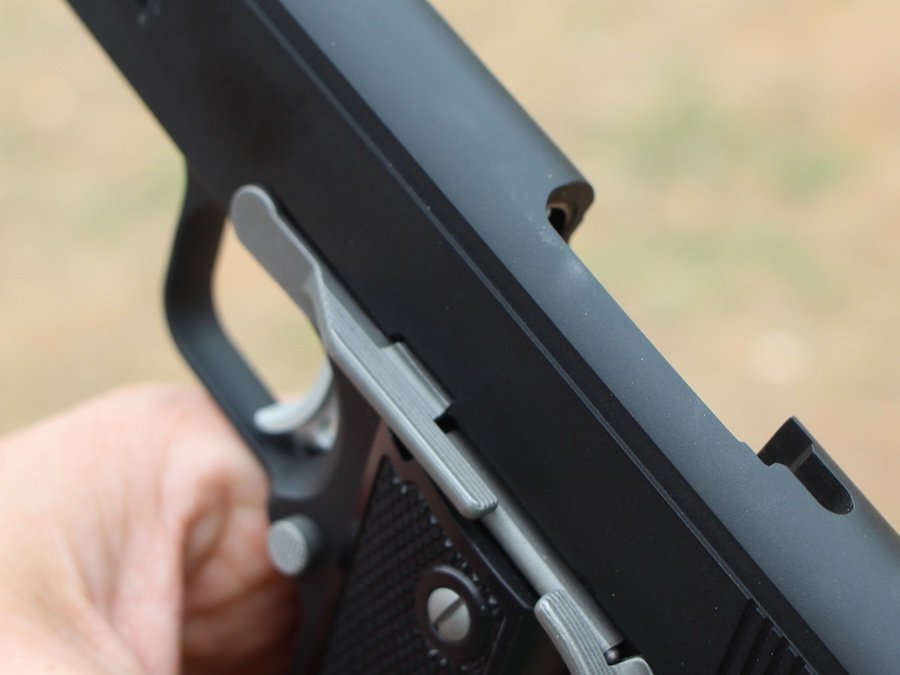 If you're right handed, as most of us are, you have to keep your left thumb clear of the slide stop. If you bump it up, the gun locks open, like this.