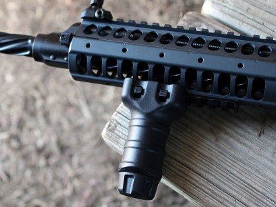 The rail can be configured as you'd like, but comes with a Magpul fore grip.
