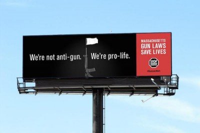 The anti-gun signs Clear Channel decided to take down.  (Photo: Boston Globe)