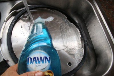 Don't ignore the directions to wash your canner parts with soap to get off manufacturing oils. 