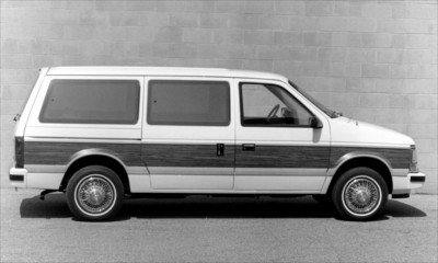 This isn't my van, but I couldn't find a photo of it.  Same model, different color. Chicks dig the ragged out minivan.