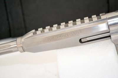 The rail segment is machined into the barrel shroud.