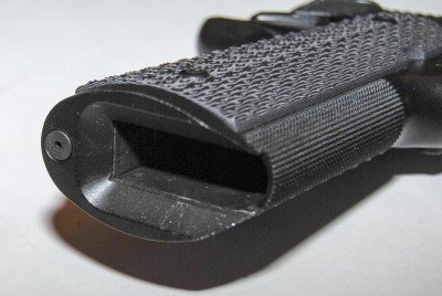 The generous and well-beveled magazine well extension makes reloads a snap.