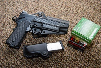 I didn't have any trouble with standard 1911 holsters, like this Blackhawk! Serpa.