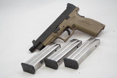 Both 9mm and .45 ACP models come with three magazines. The 9mm mags hold 19 rounds while the .45's hold 13.