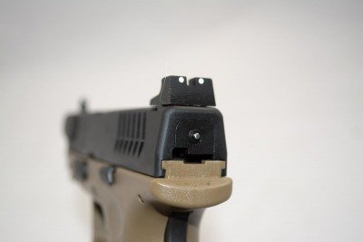 Tall rear sight for suppressor use and the XD(M) cocking indicator.