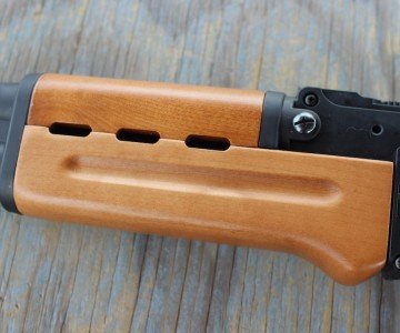 The handguard is wooden, and much easier to get on and off than that or a genuine AK.