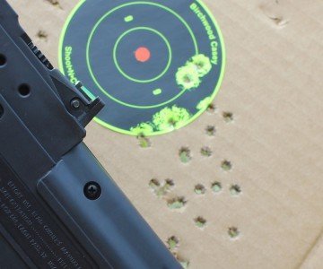 25 yards, standing. The light weight of the gun makes it very easy to hold. 