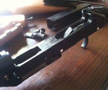 The barrel joins to this hunk of dense polymer which houses the trigger. 