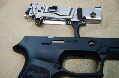 Removable serialized chassis/frame/FCU = gun (top). Gun-shaped polymer parts and slide assembly - not a gun.