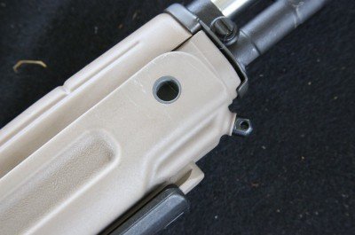 There is still a sling swivel in the front, as well as front and rear ball bearing swivel mounts. The gun doesn't come with those swivels, nor does the original Archangel. 