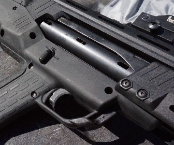 DP-12 Review--A Functional Double Barrel Bullpup The action is based off of the Ithaca 37.