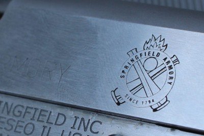 Monday Gun Day Giveaway: Springfield Armory Mil-Spec 1911 I've always been a fan of Springfield's use of the crossed canons, and it looks good on a 1911.