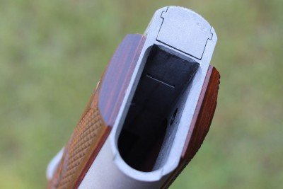 The mag well has the edges knocked off, but it isn't as flared as what you'll find on many carry 1911s. 