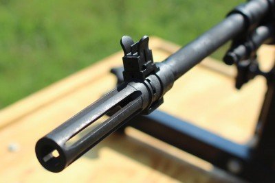 The muzzle brake is long and surprisingly efficient. The design (coupled with the gun's weight) keeps the muzzle from climbing.